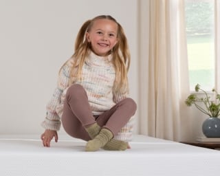 a child on a mattress