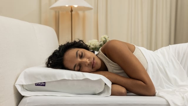 purple pillow woman sleeping