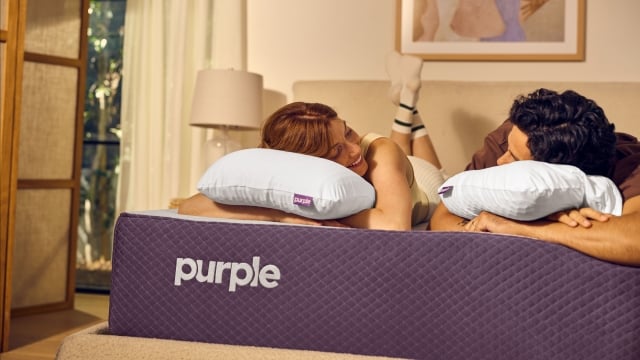 couple on purple mattress