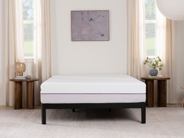 metal platform with naked mattress