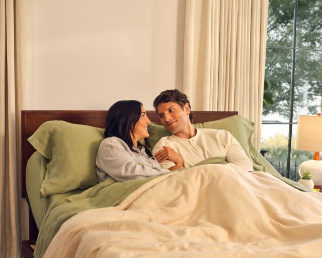 couple laying in bed together