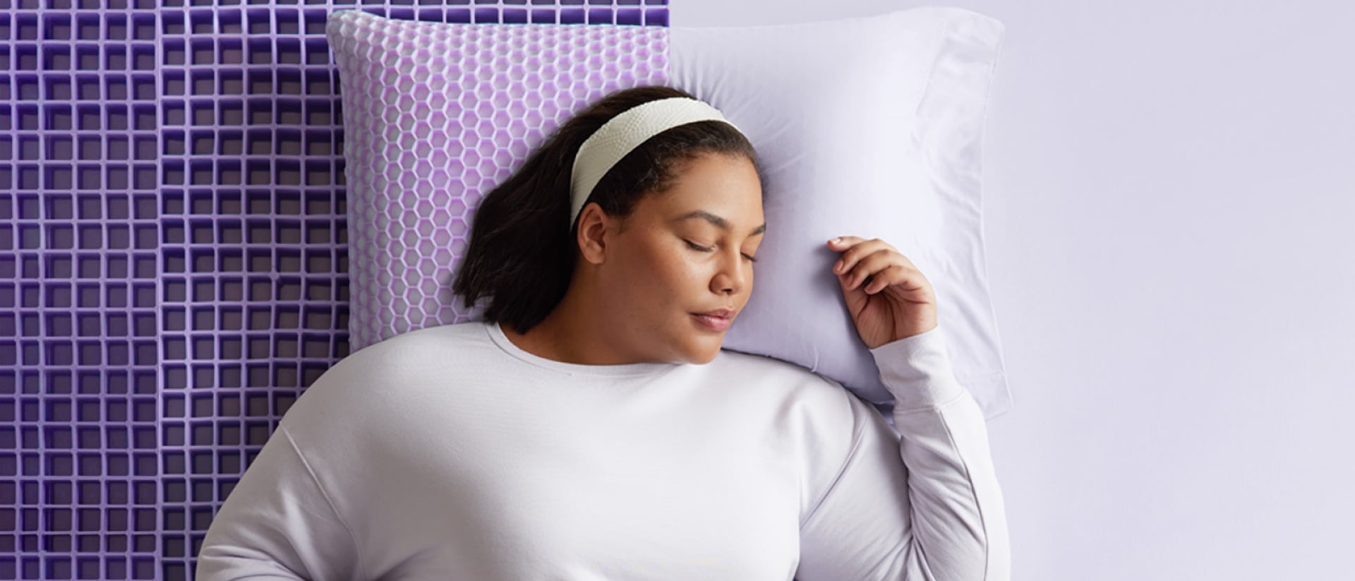 Woman on Half Exposed Grid Mattress and pillow