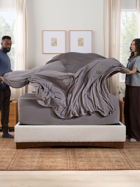 SS sheets gray w/ talent making bed